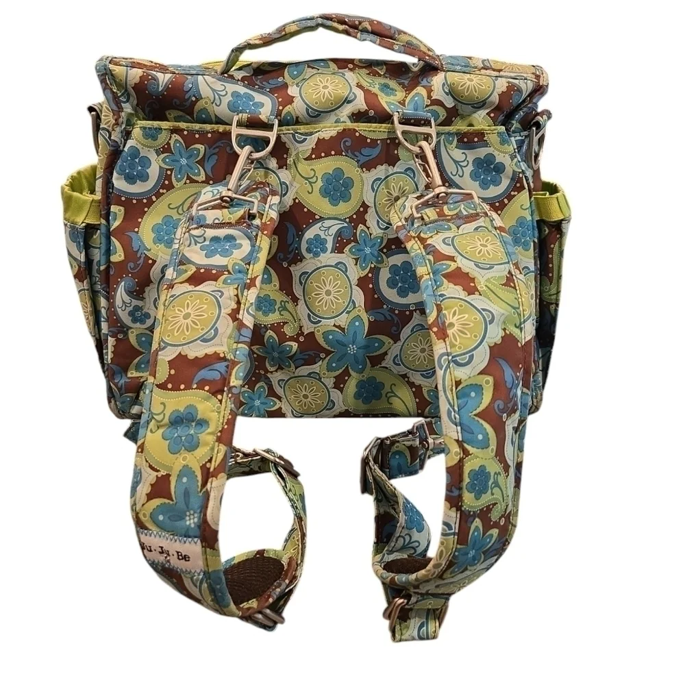 JU JU BE BACKPACK DIAPERBAG WITH CHANGING PAD. PAISLEY AND FLORAL.